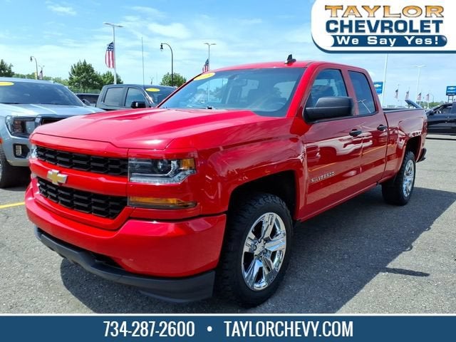 2018 Chevrolet Silverado 1500 Custom in Red Hot — front three-quarter view