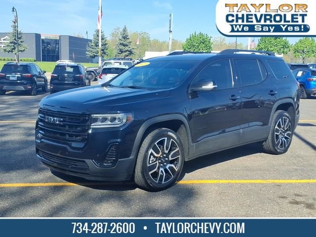 2021 GMC Acadia SLE in Midnight Blue Metallic — front three-quarter view