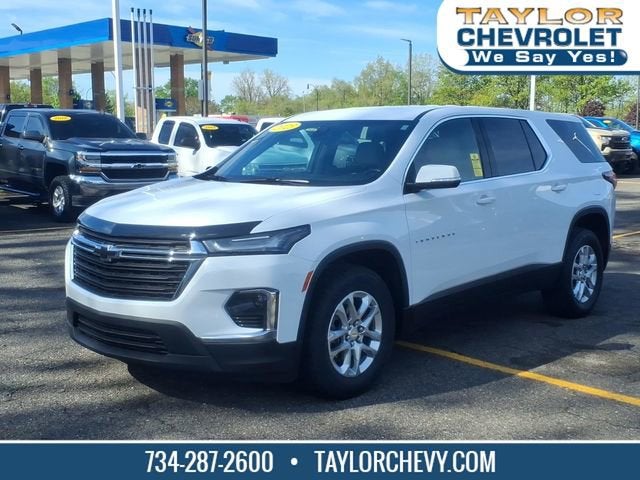 2023 Chevrolet Traverse LS in Summit White — front three-quarter view