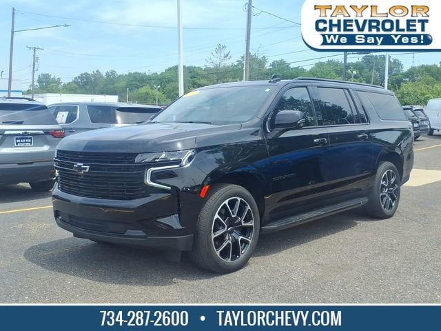 2024 Chevrolet Suburban RST in Black — front three-quarter view