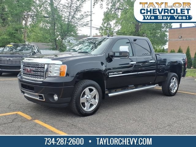 2013 GMC Sierra 2500 HD Denali in Onyx Black — front three-quarter view