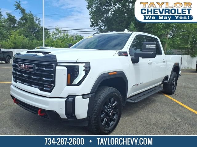 2024 GMC Sierra 2500 HD AT4 in Summit White — front three-quarter view