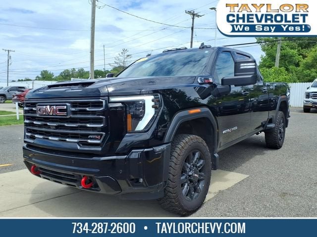 2025 GMC Sierra 2500 HD AT4 in Onyx Black — front three-quarter view