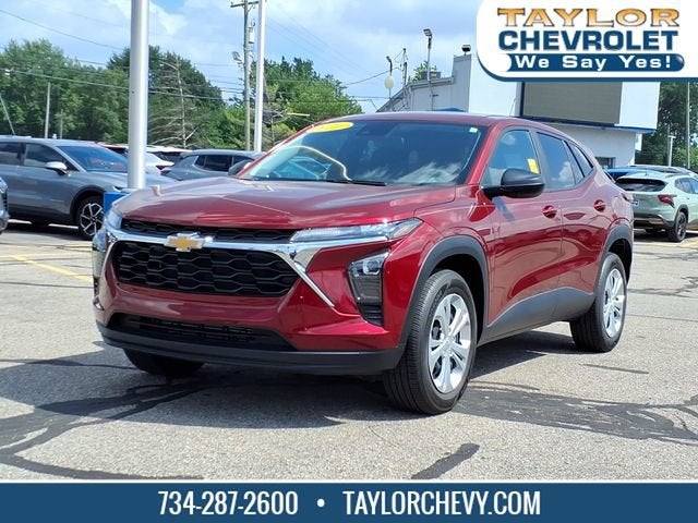 2024 Chevrolet Trax LS in Crimson Metallic — front three-quarter view