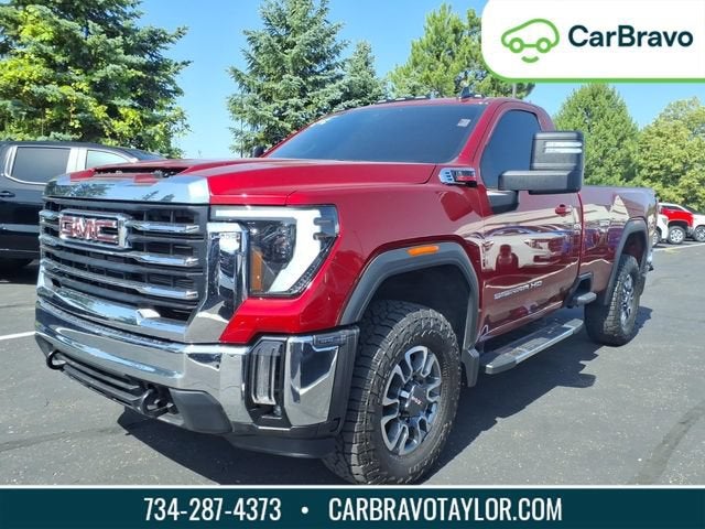 2024 GMC Sierra 3500 HD SLE in Volcanic Red Tintcoat — front three-quarter view
