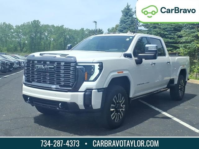 2024 GMC Sierra 2500 HD Denali Ultimate in White Frost Tricoat — front three-quarter view