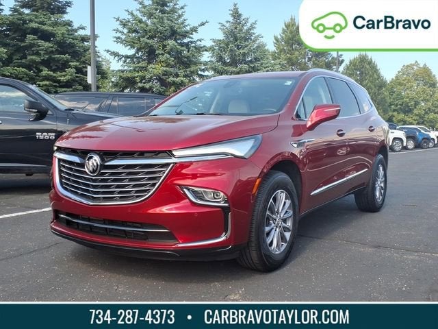 2024 Buick Enclave Essence in Cherry Red Tintcoat — front three-quarter view