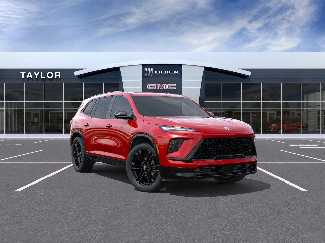 2026 Buick Enclave Sport Touring in Cherry Red Tintcoat — front three-quarter view