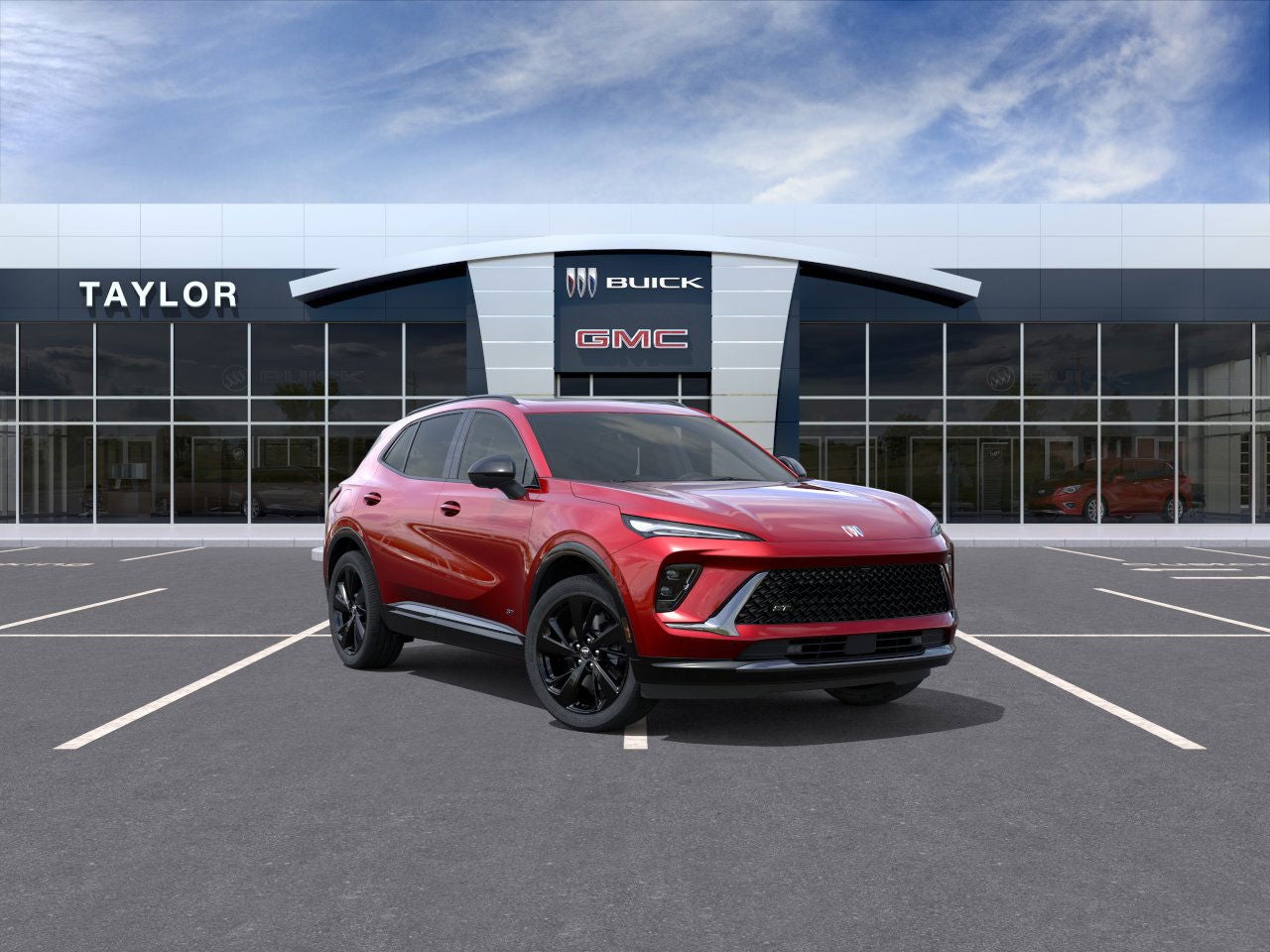2026 Buick Envision Sport Touring in Brilliant Red — front three-quarter view